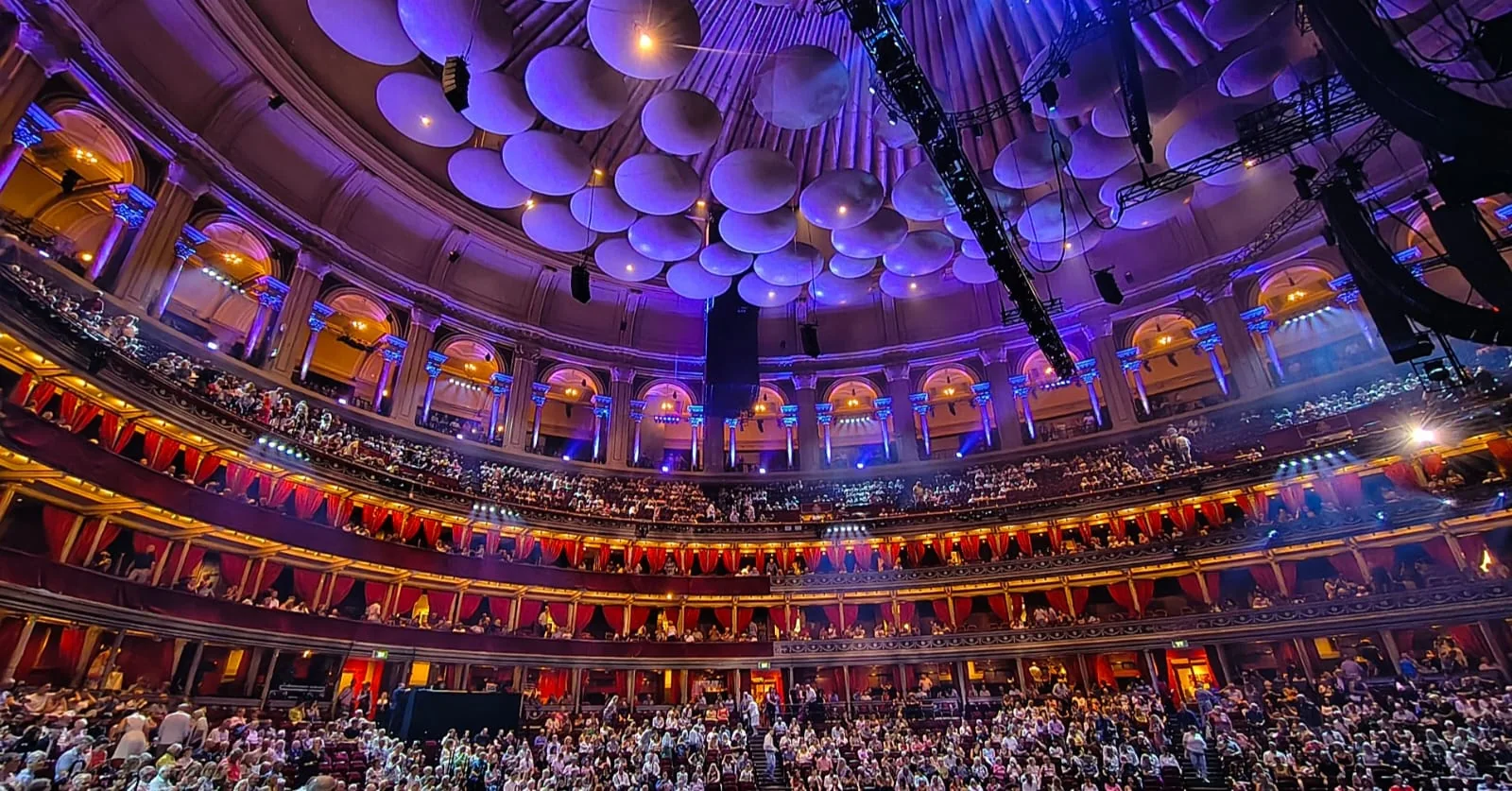 Interior of the Royal Albert Hall filled with audience members.